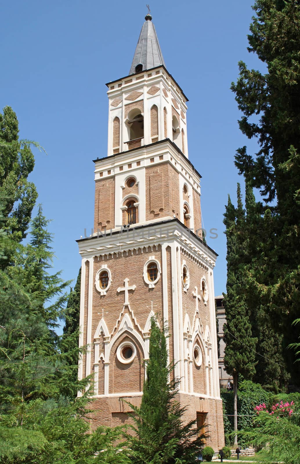 SIGHNAGHI, GEORGIA - JULY 4, 2014: Belfry of the Bodbe Monastery, tomb of the Holy Nino on July 4, 2014 in Sighnaghi, Georgia, Europe