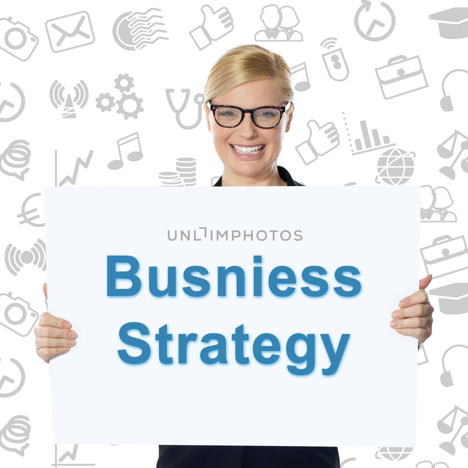 Smiling businesswoman holding business strategy banner