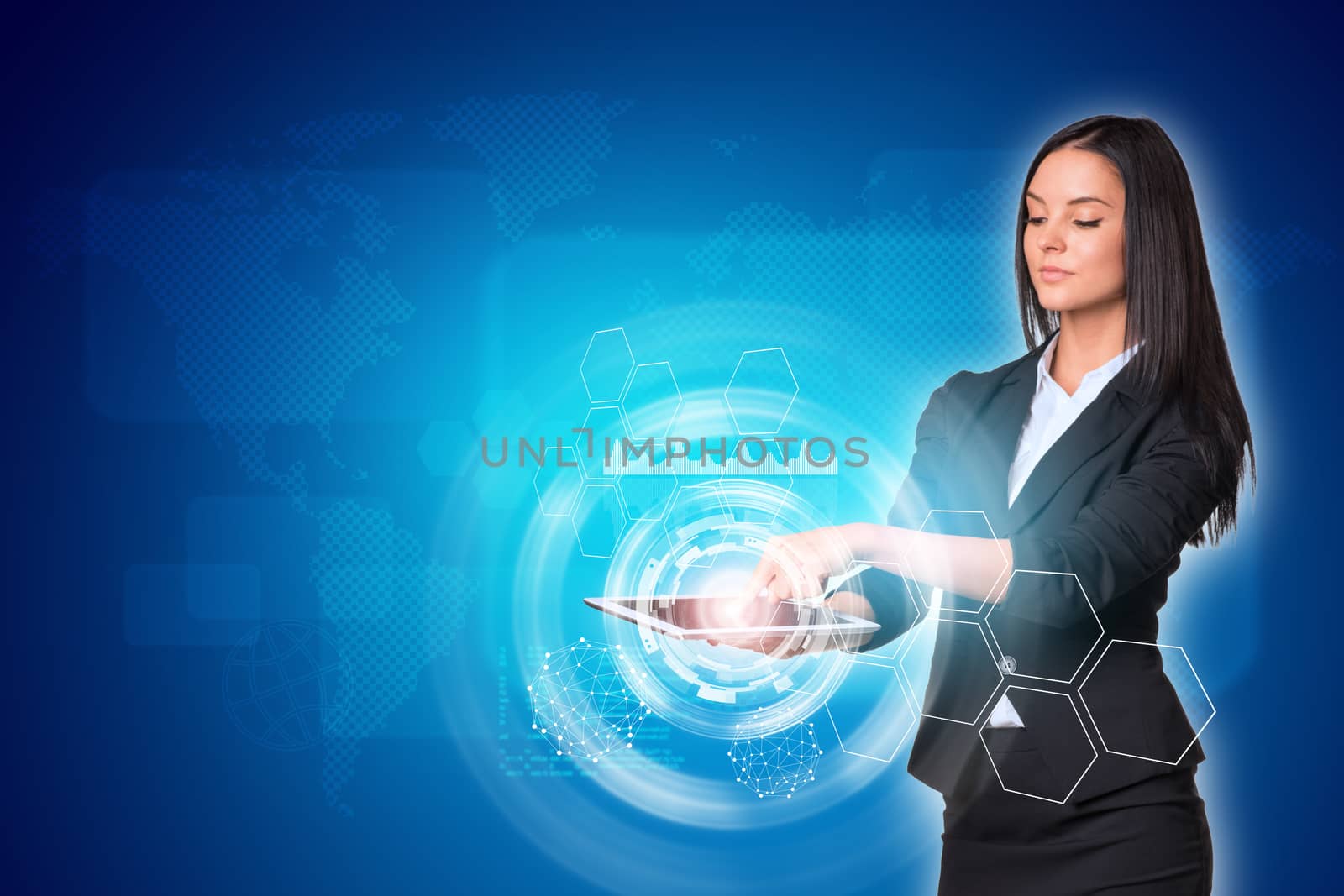 Beautiful businesswomen in suit using digital tablet. World map with circles and hexagons