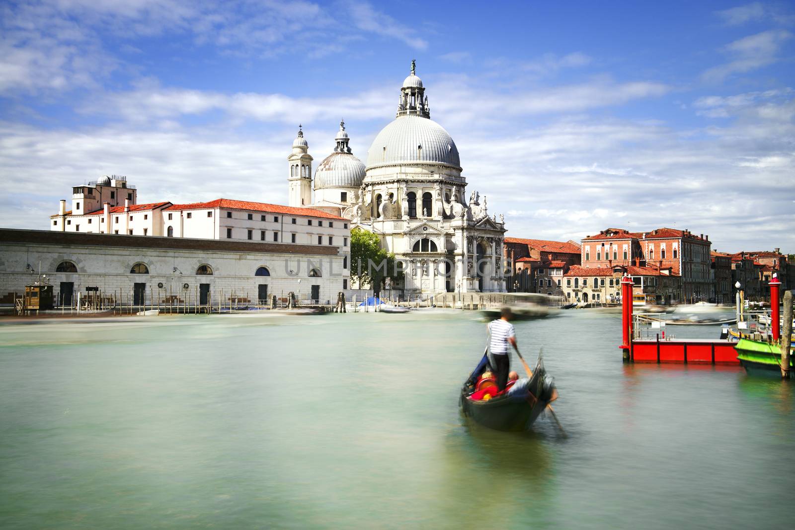 Gondola on Canal Grande with Basilica di Santa Maria della Salute in the background, Venice, Italy 