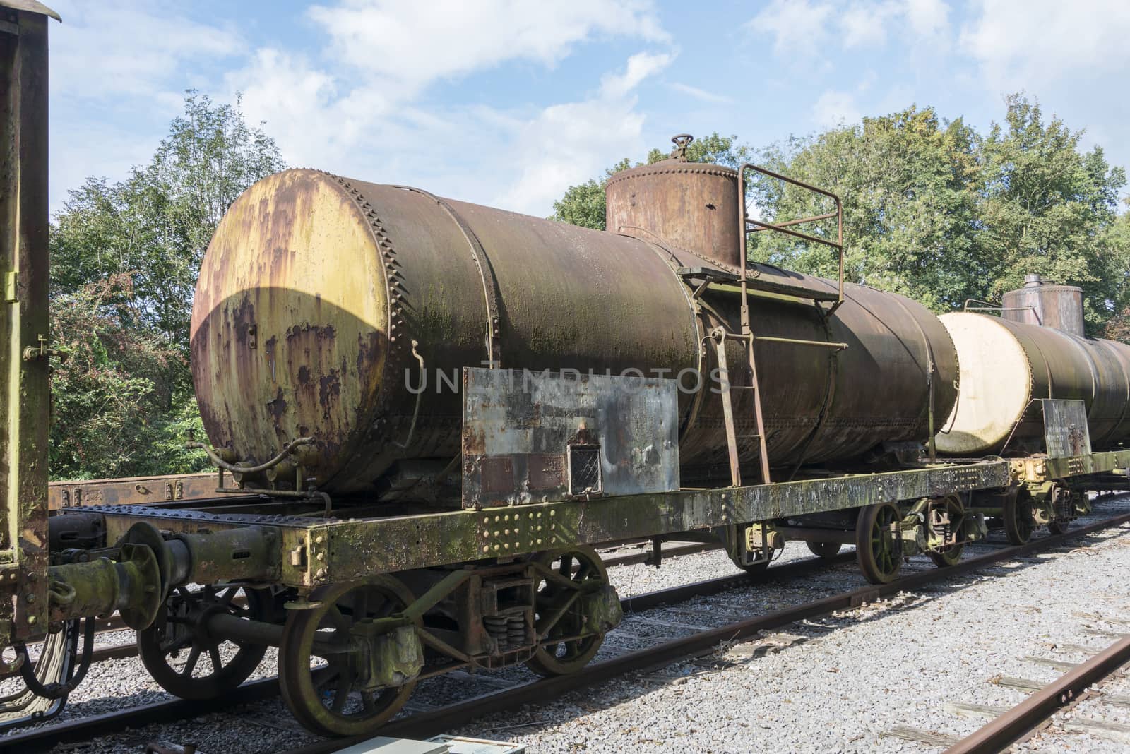 old rusted train at trainstation hombourg by compuinfoto