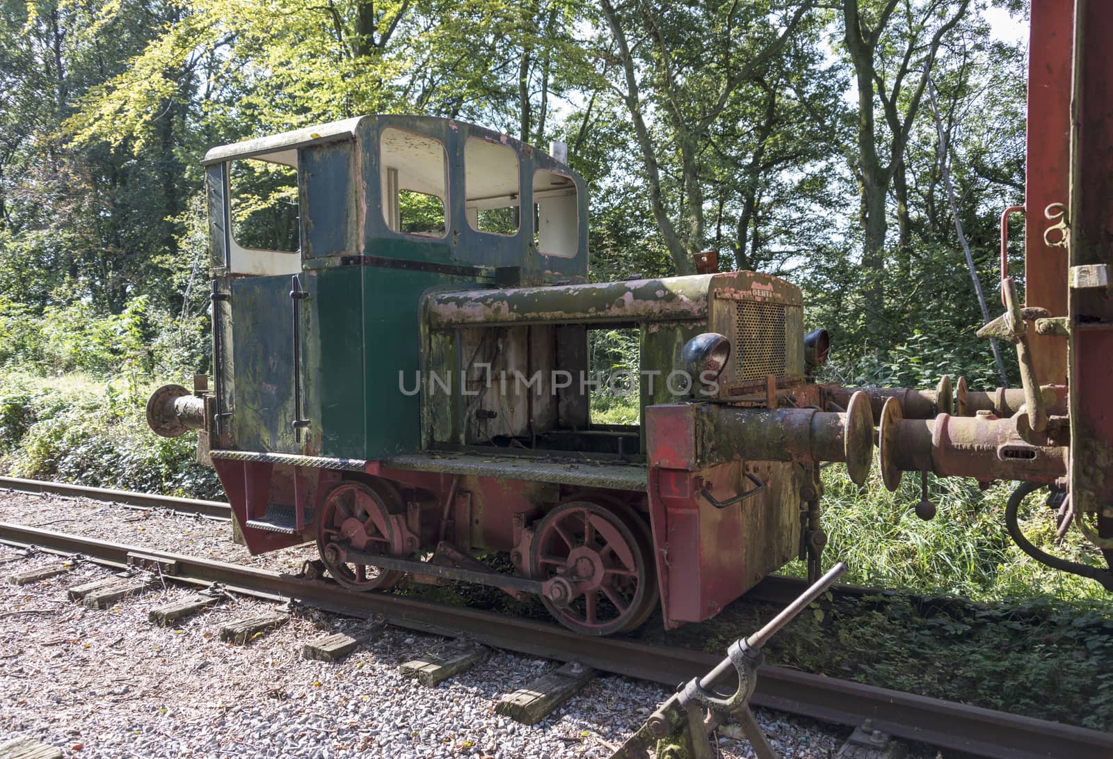 old rusted train locomotive at trainstation hombourg by compuinfoto