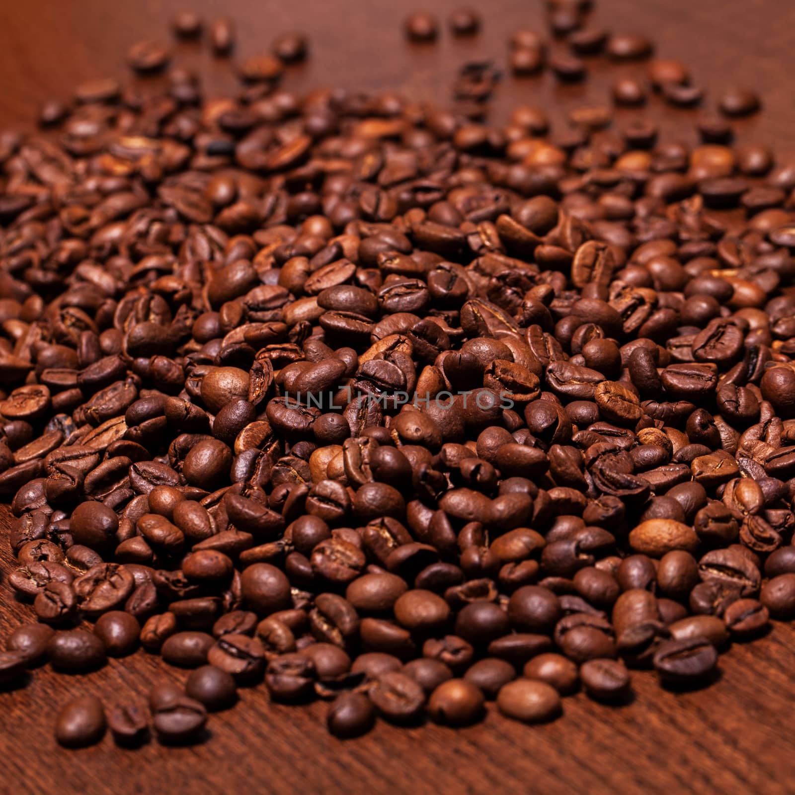 Closeup image of roasted coffee grains by rufatjumali