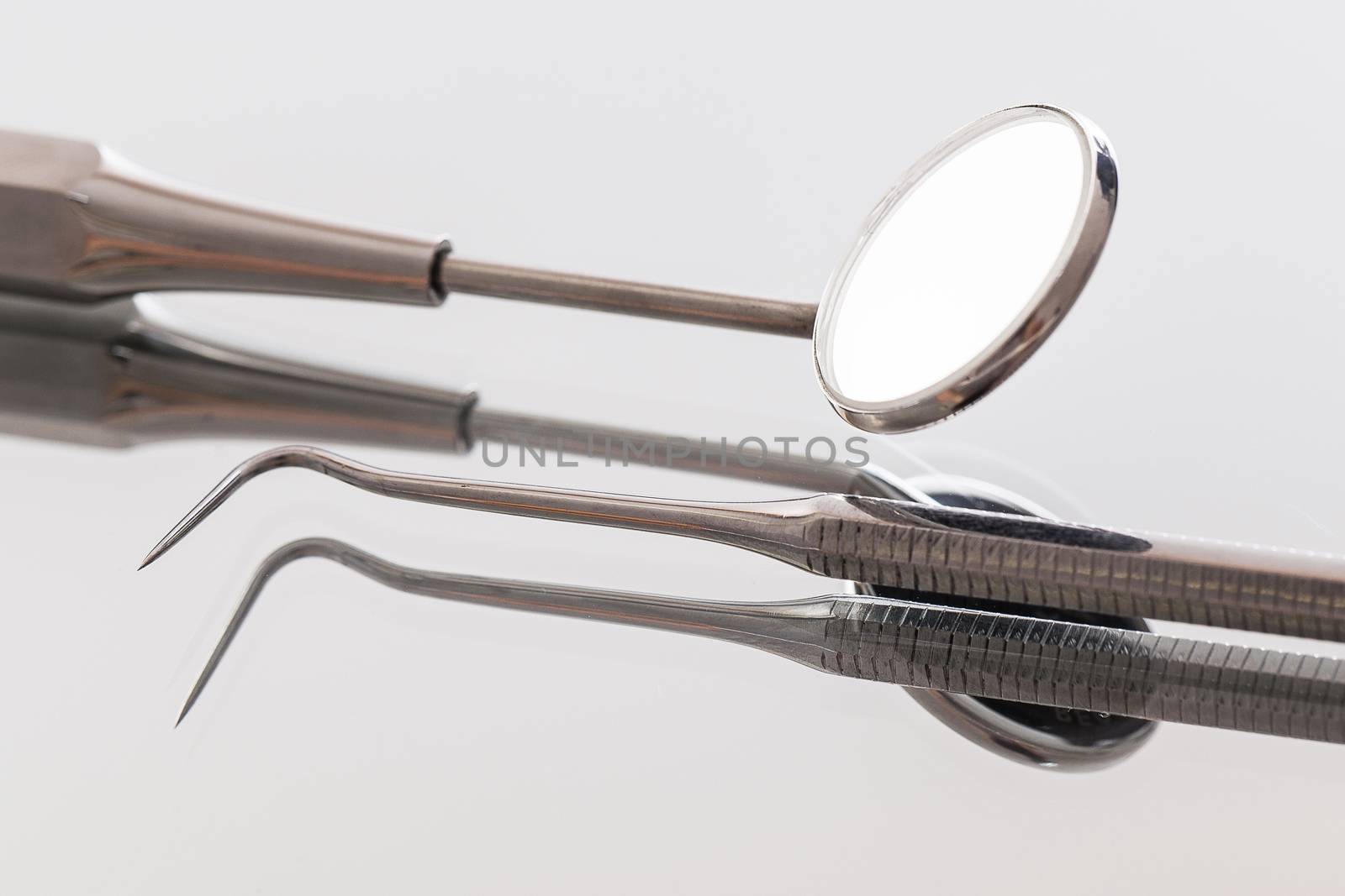 Many instruments that are use by a dentist