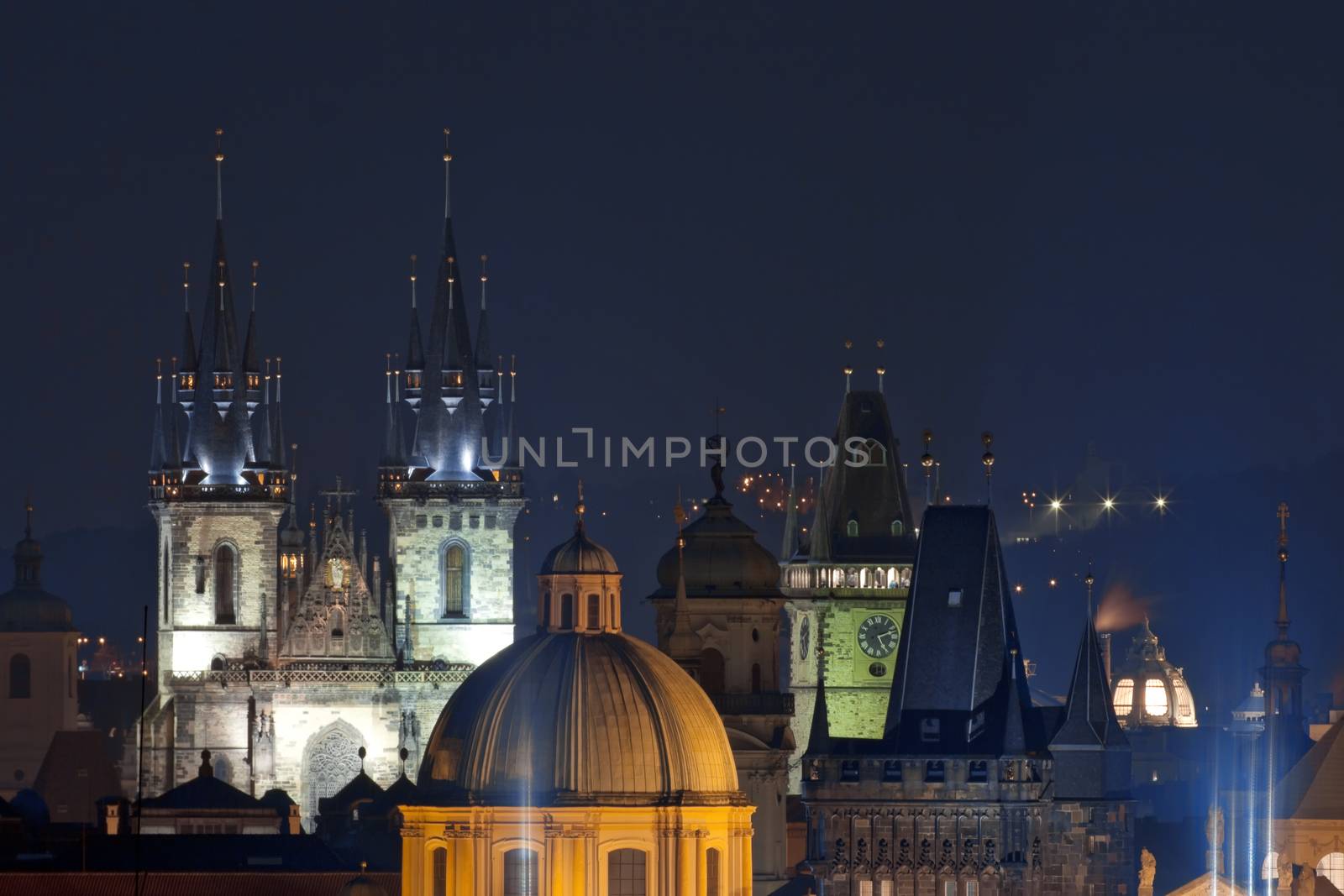 czech republic, prague - spires of the old town and tyn church at dusk