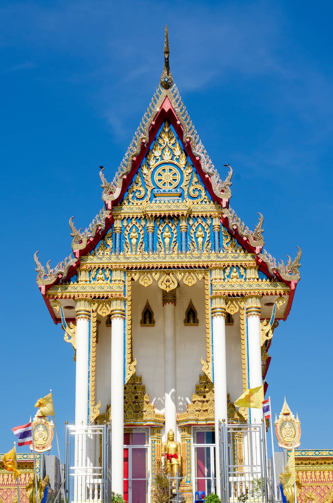 Thai temple on the blue sky background