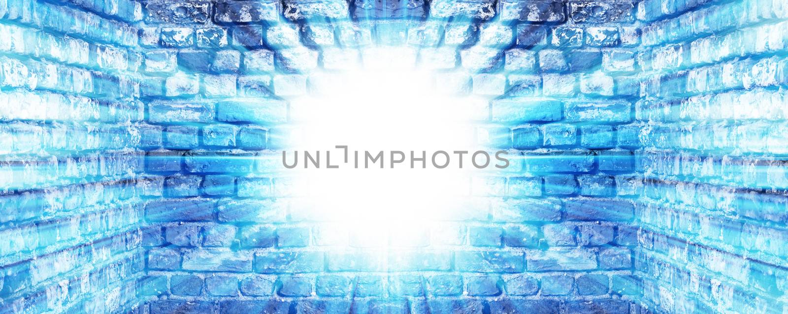 Old brick wall background with blue light on it