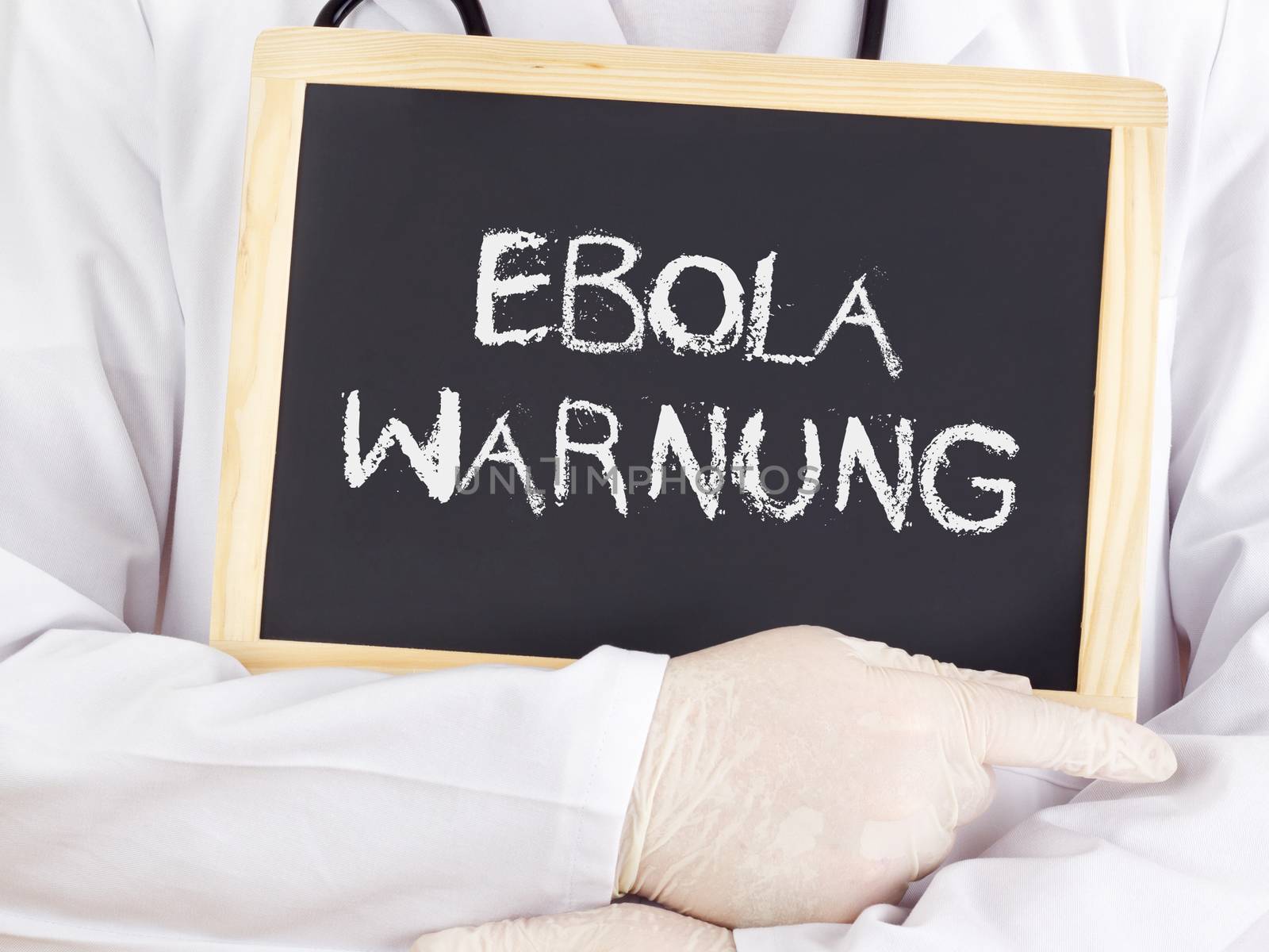 Doctor shows information: Ebola warning in german