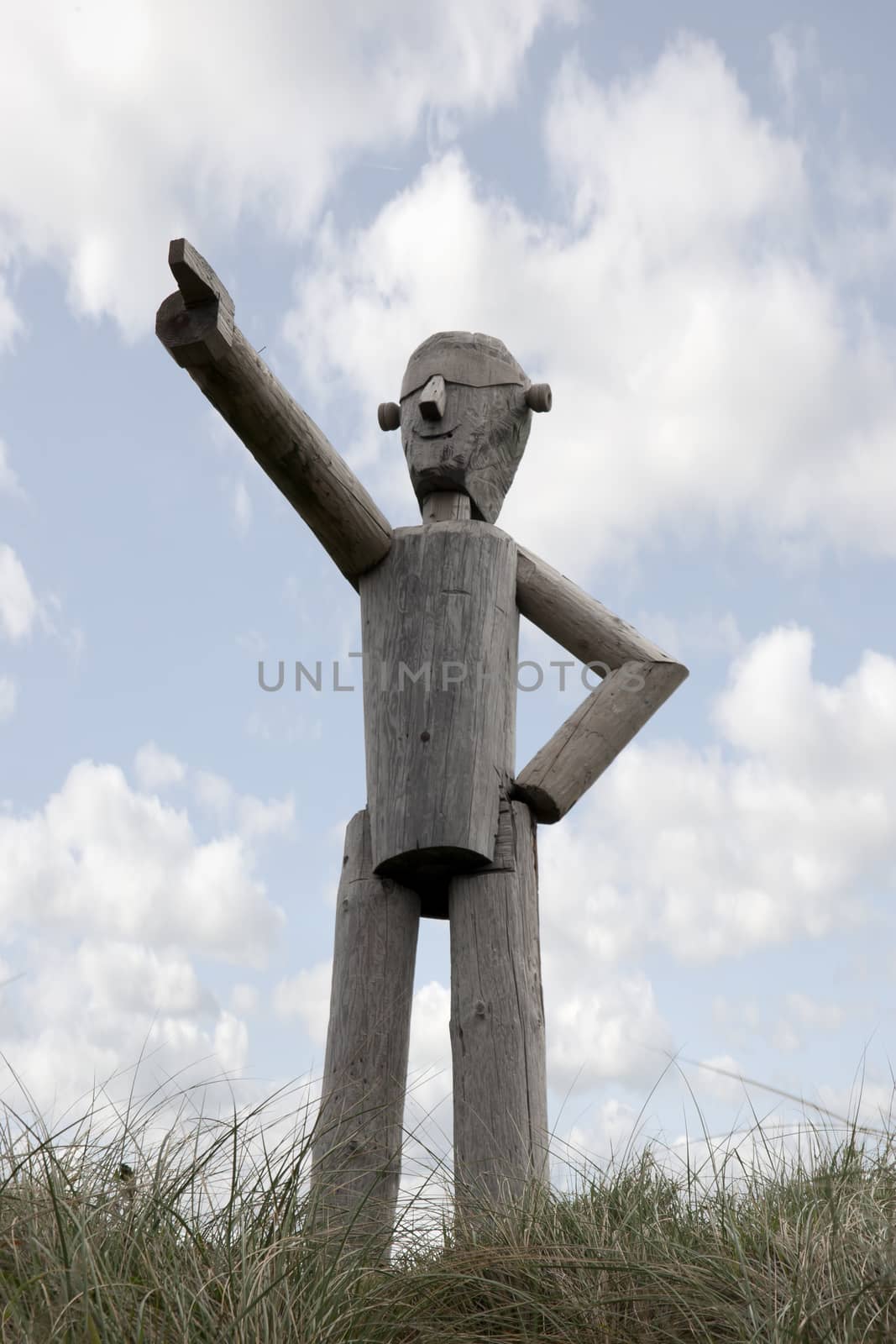 directions from a wooden sculptured man by morrbyte