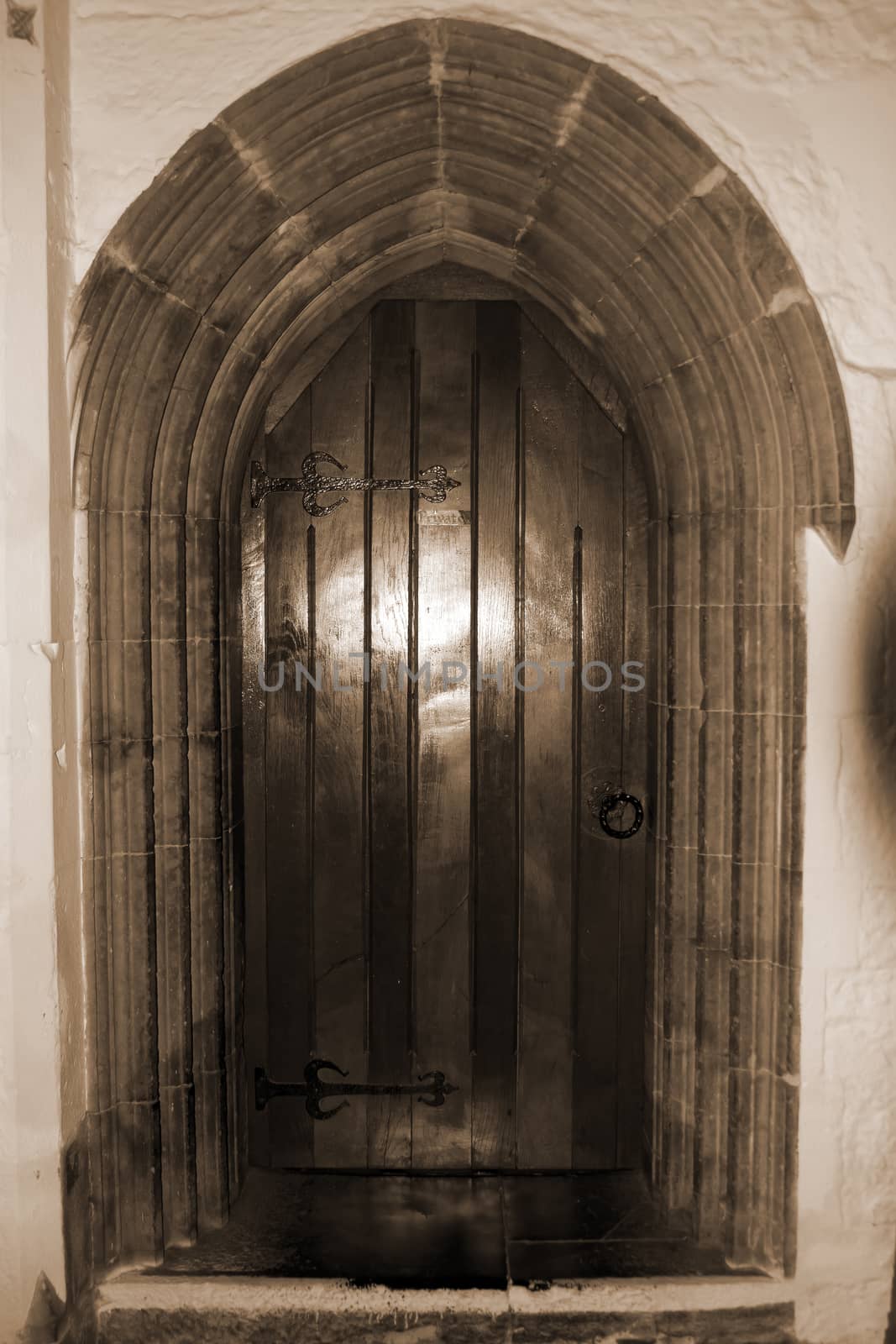 door at the chapel of Holycross abbey county Tipperary Ireland in sepia