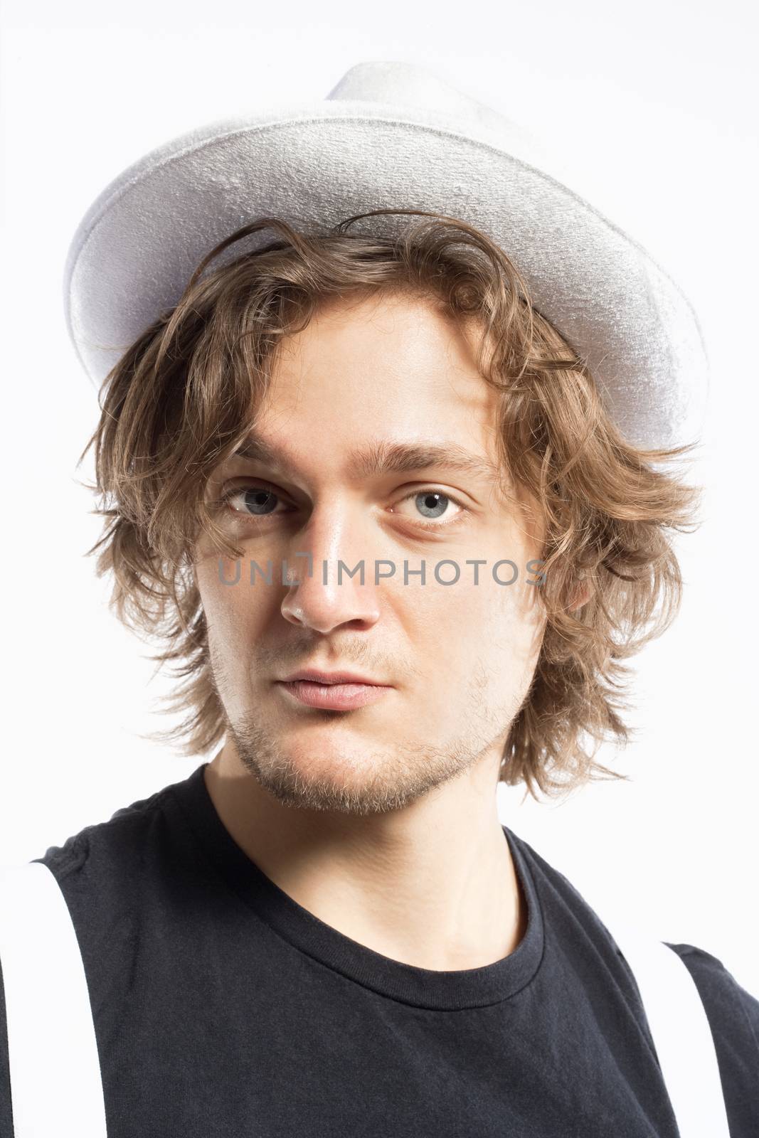 Portrait of a Young Man with Brown Hair and White Hat by courtyardpix