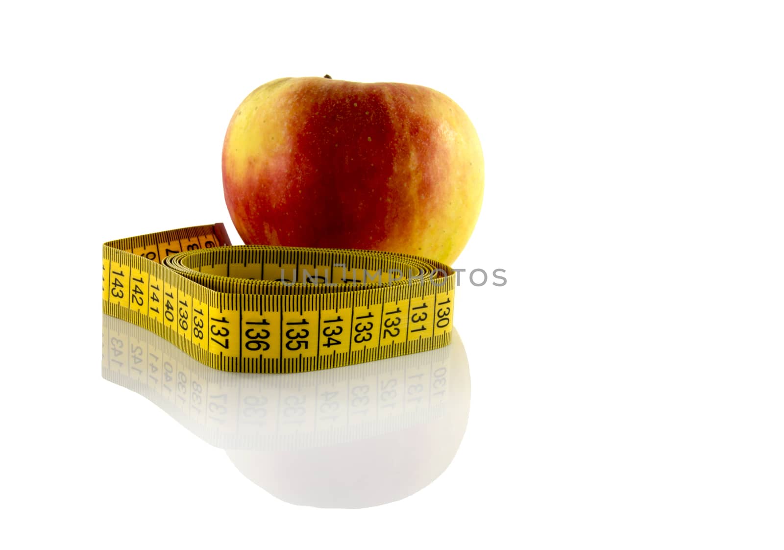 apple with measurement tool by compuinfoto