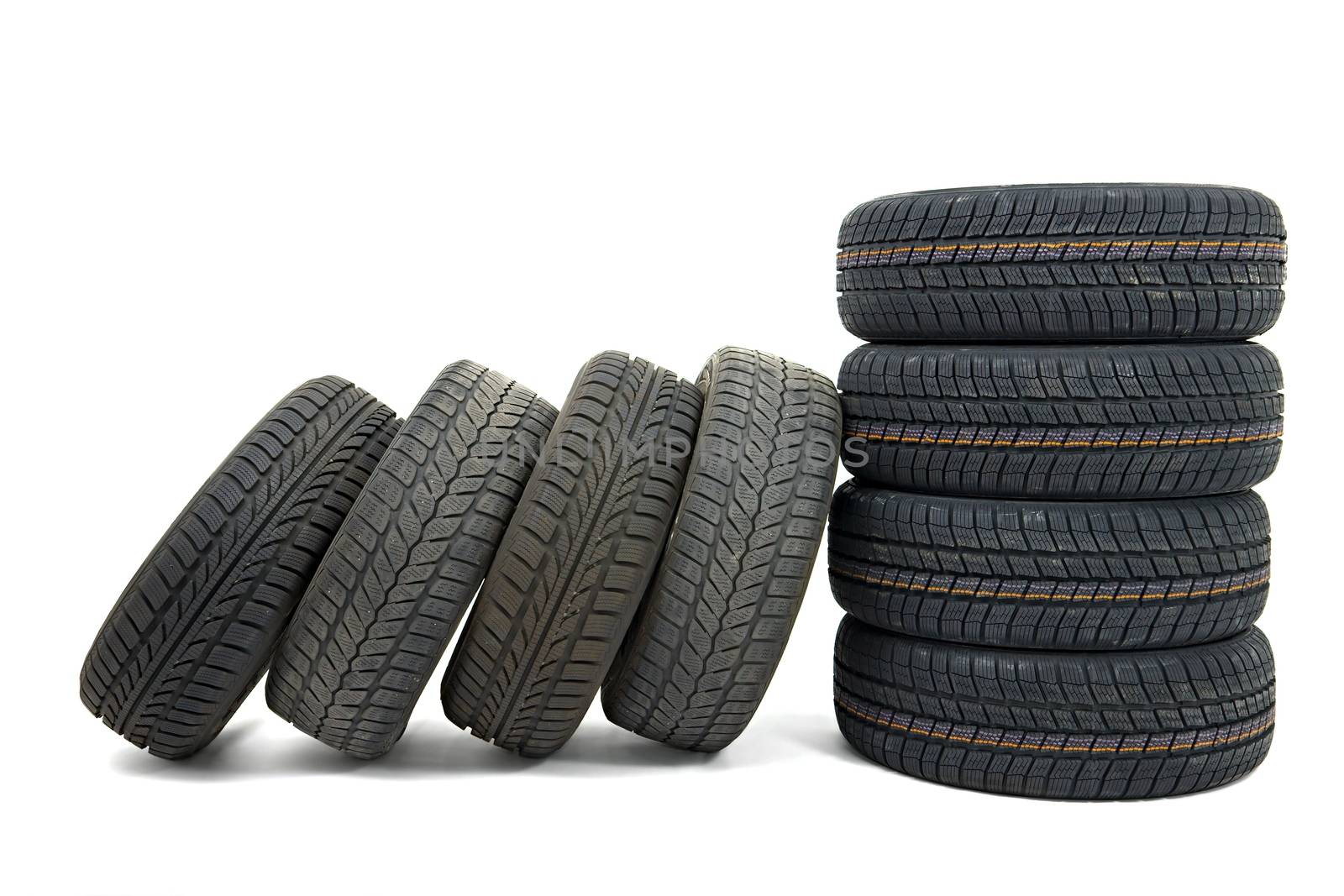 Many car tyres in a pile
