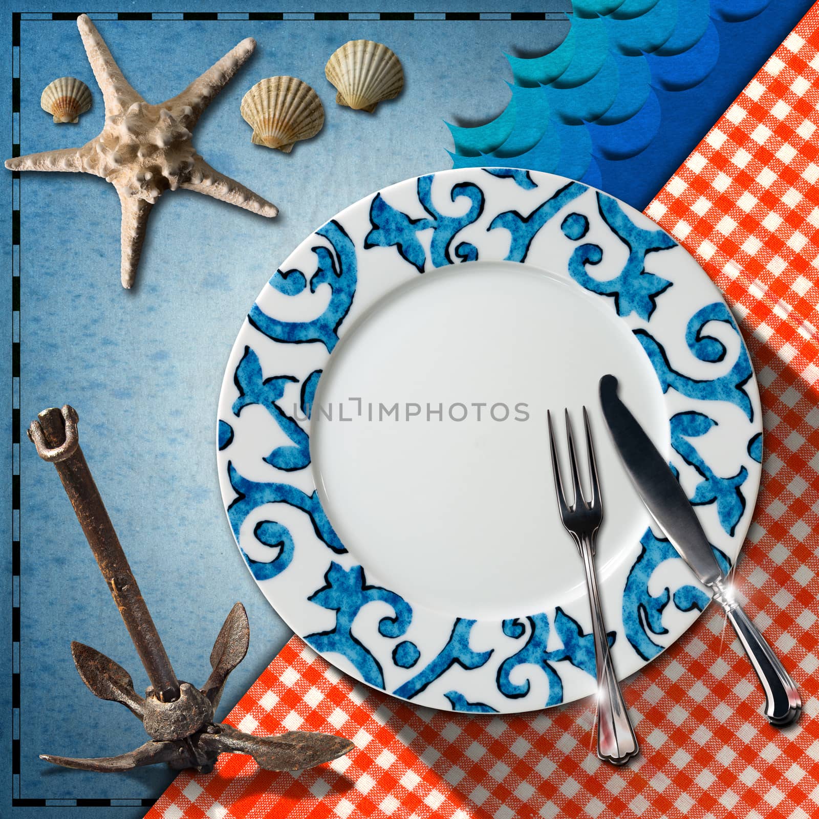 Empty plate with fork and knife, red and white checkered tablecloth, seashells, starfish, blue waves and rusty anchor. Table set for a seafood menu