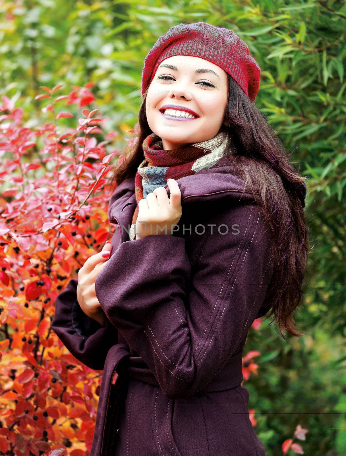 Young woman posing outdoors by Nobilior