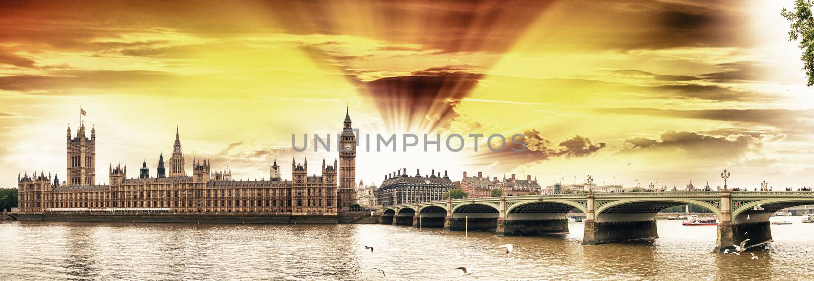 Westminster, London. View of Bridge and Houses of Parliament from across river Thames.