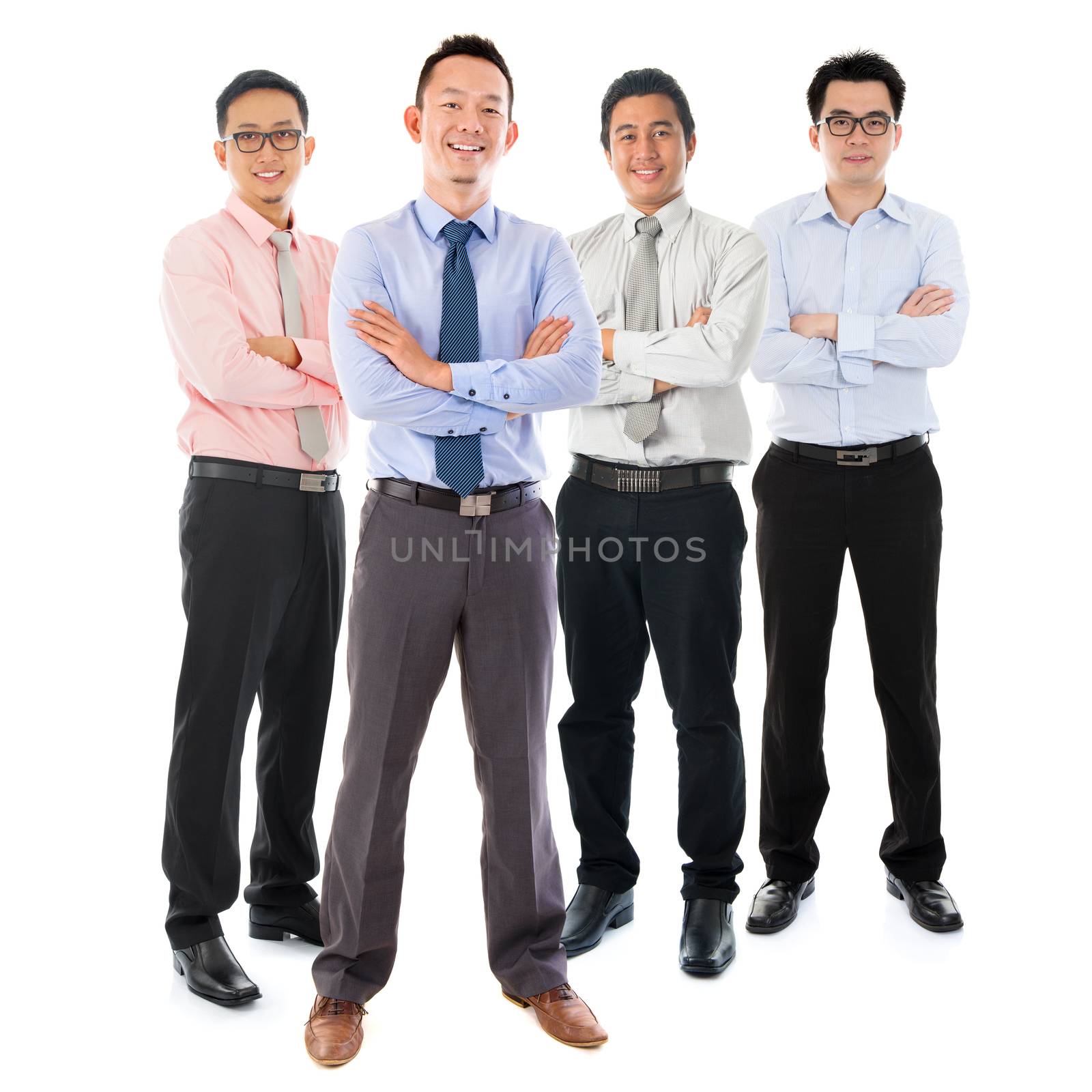 Portrait of group Southeast Asian businessmen standing isolated on white background