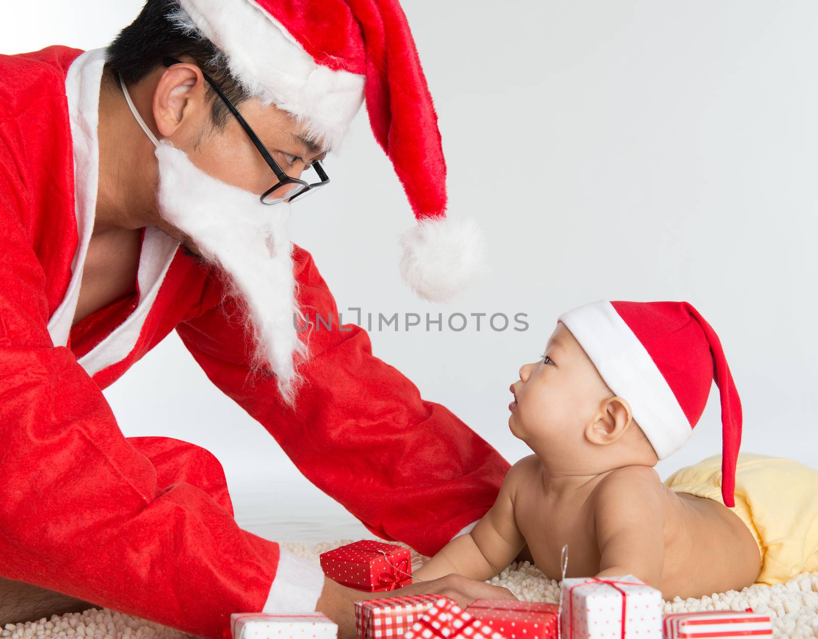 Asian santa claus with baby  by szefei