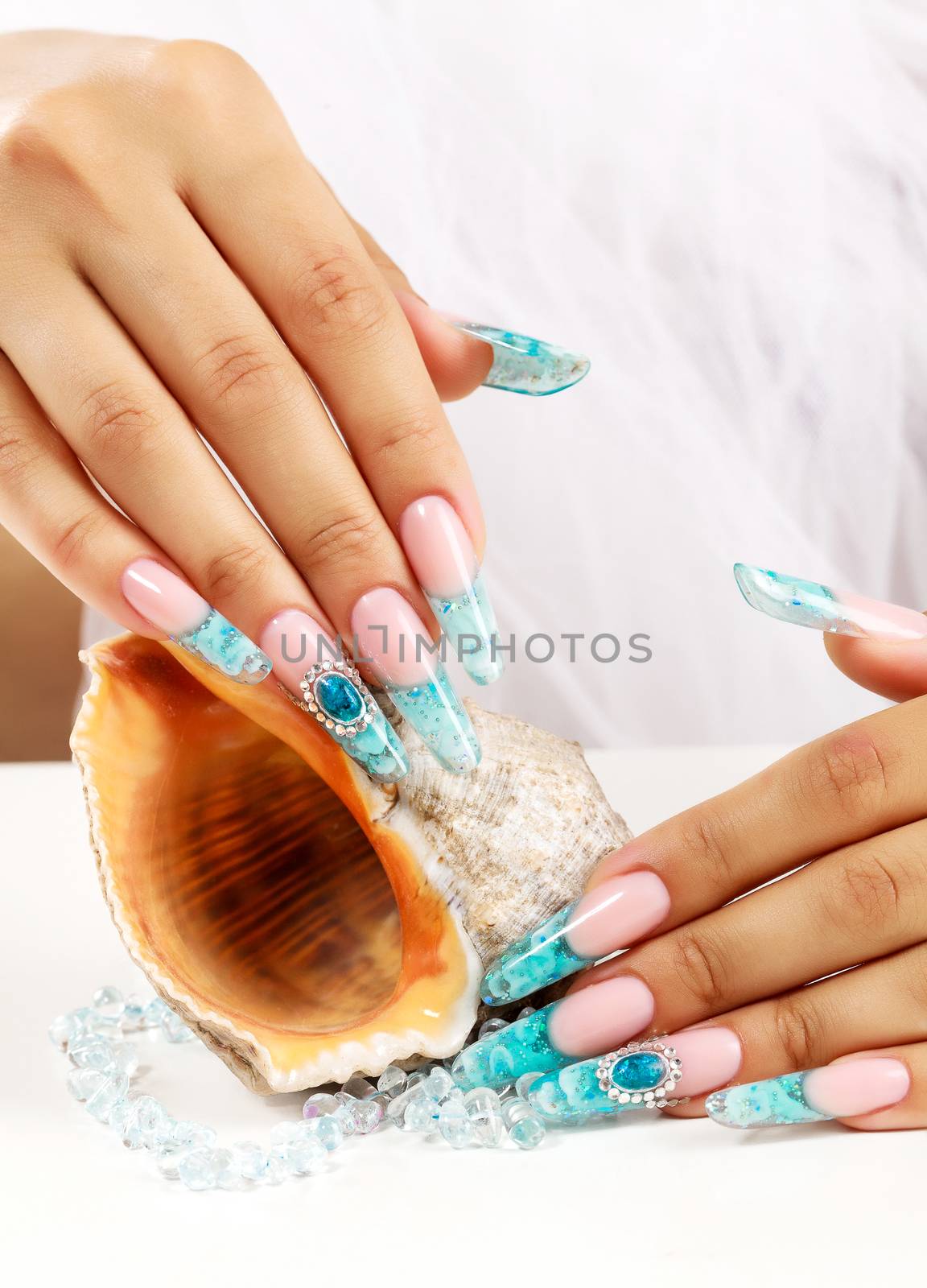 Female hands with long fingernails