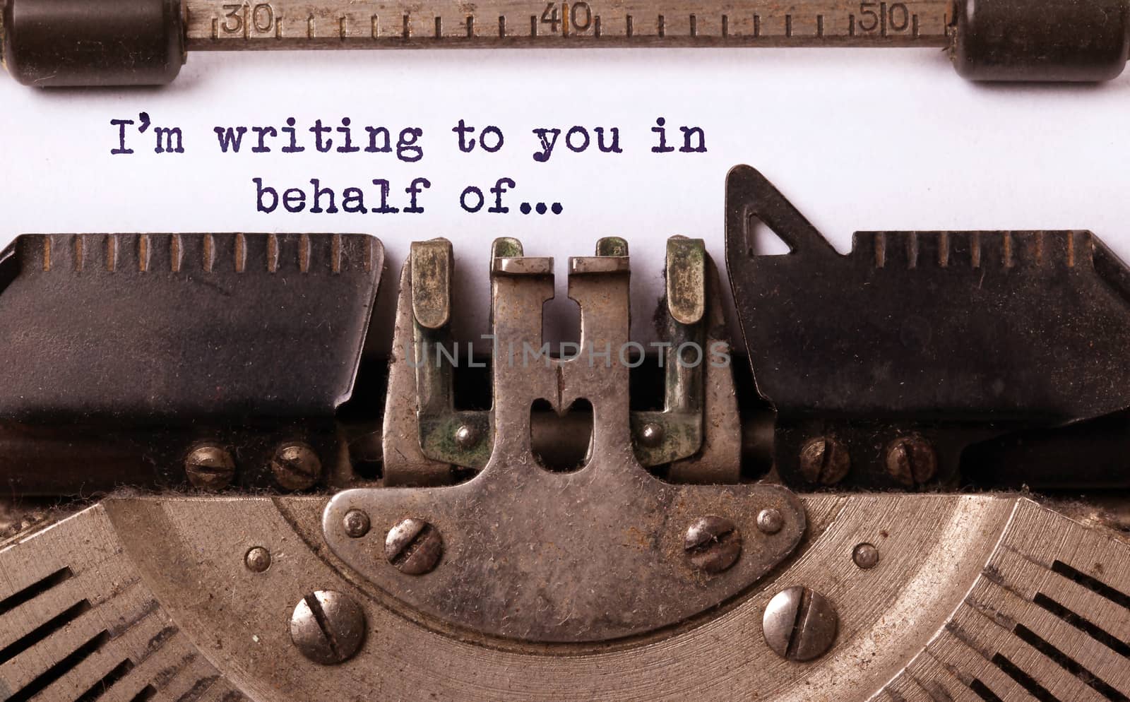 Vintage inscription made by old typewriter, I'm writing to you in behalf of