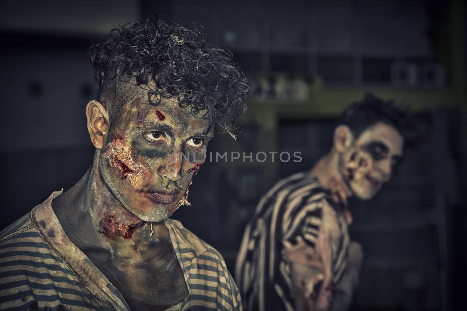 Two male zombies standing outdoor at night for Halloween by artofphoto