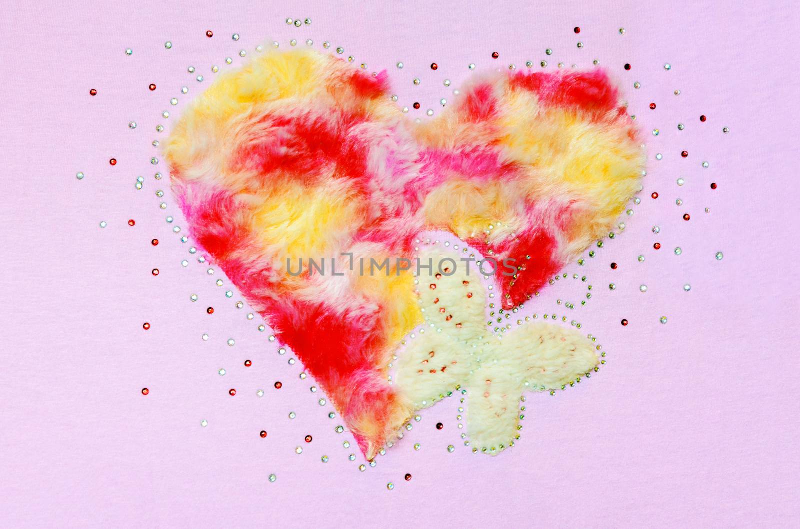 Heart butterfly fluff and sequin, Decoration on a pink fabric background
