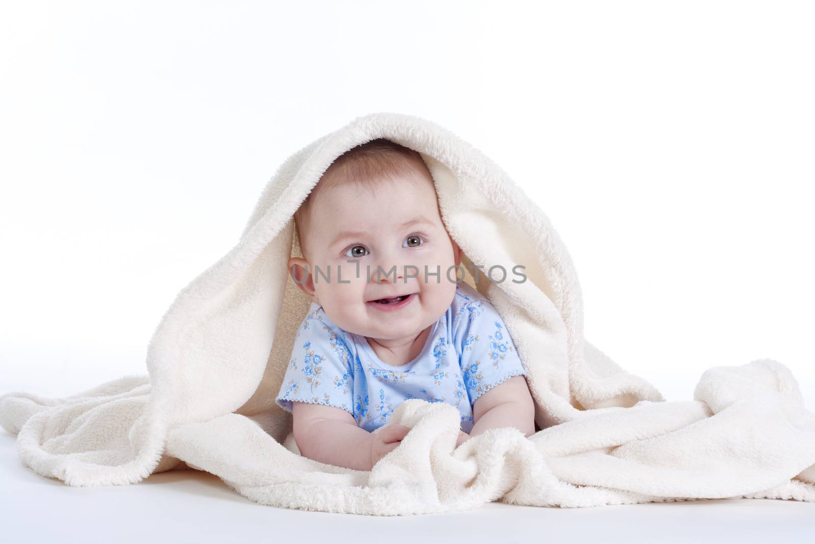 portrait of sweet little baby girl with a blanket - isolated on white