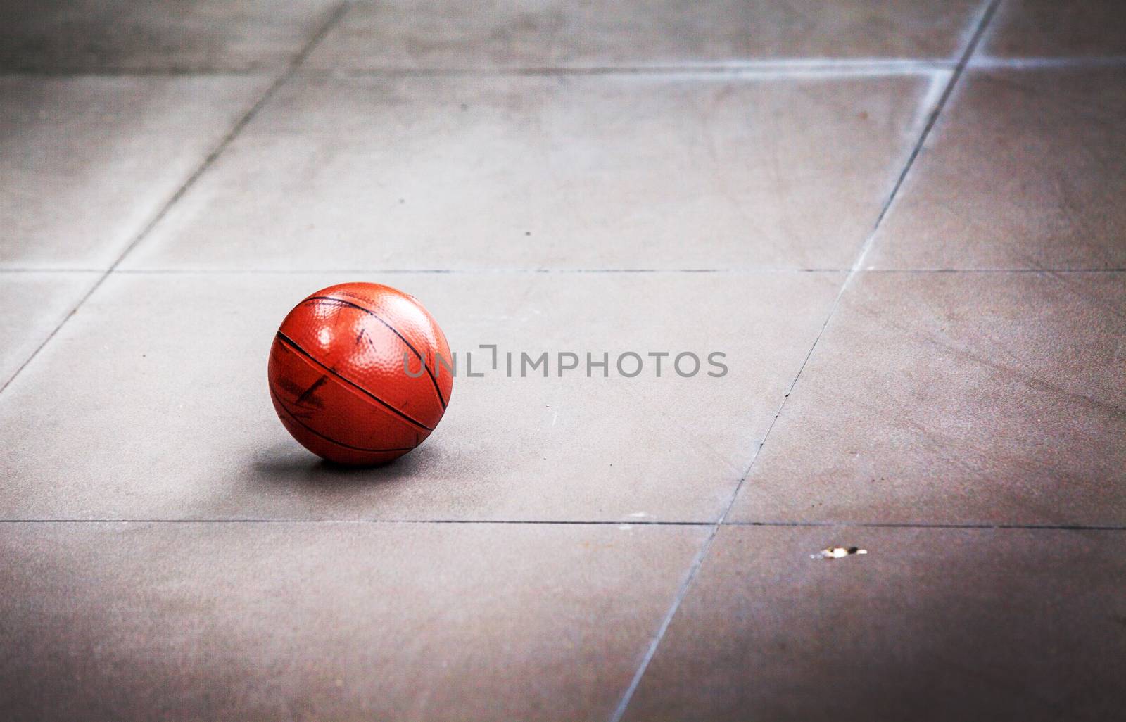 focus dirty basket ball on the cement floor