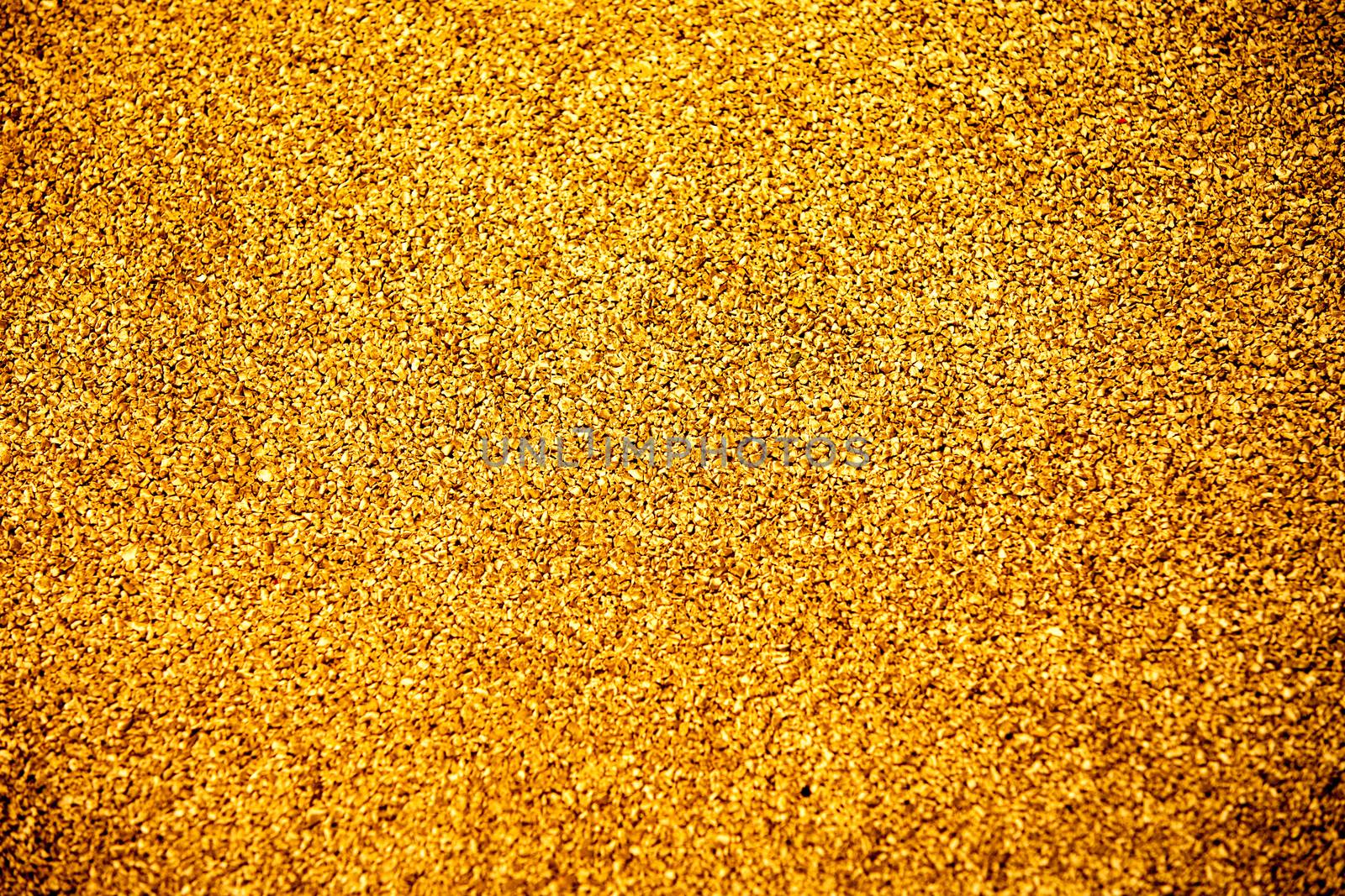 close up Texture of yellow color rubber floor on playground