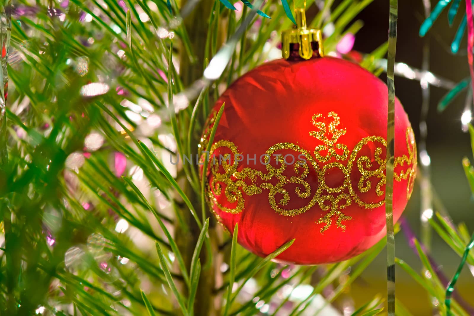 Shiny lights and nice red ball - ornaments for a Christmas tree