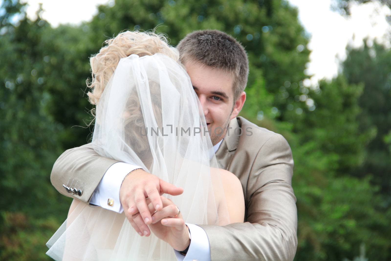 Young married couple in the wedding day