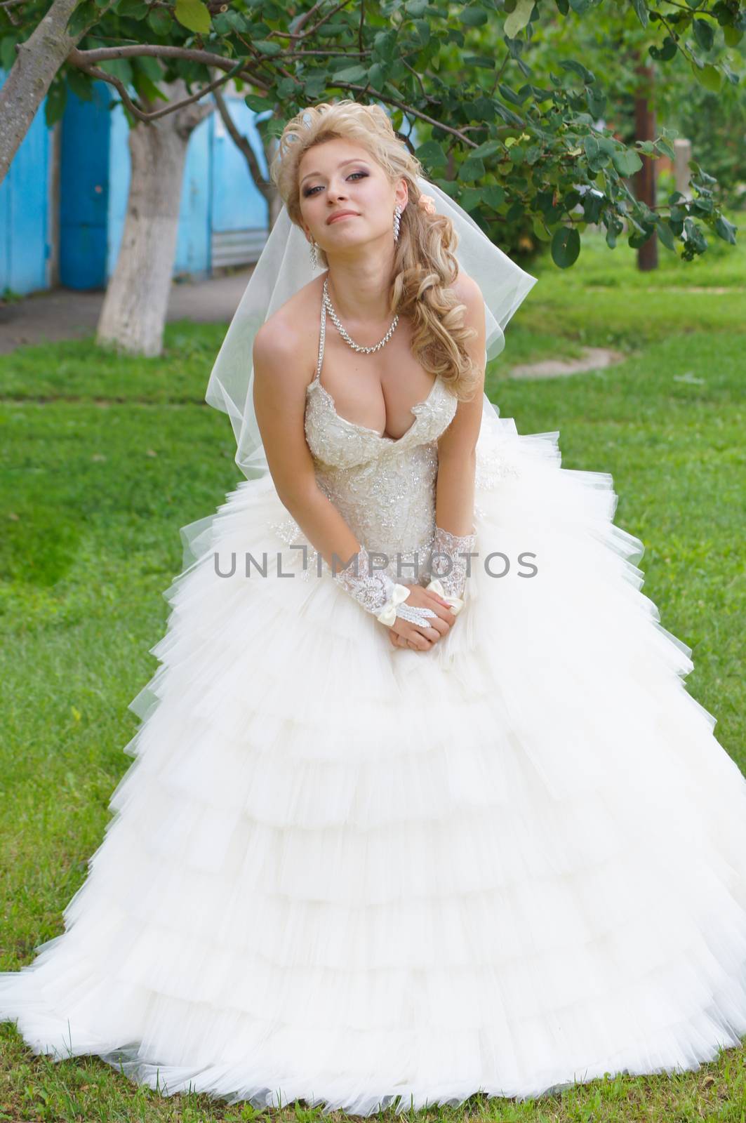 The young beautiful wife in the wedding day