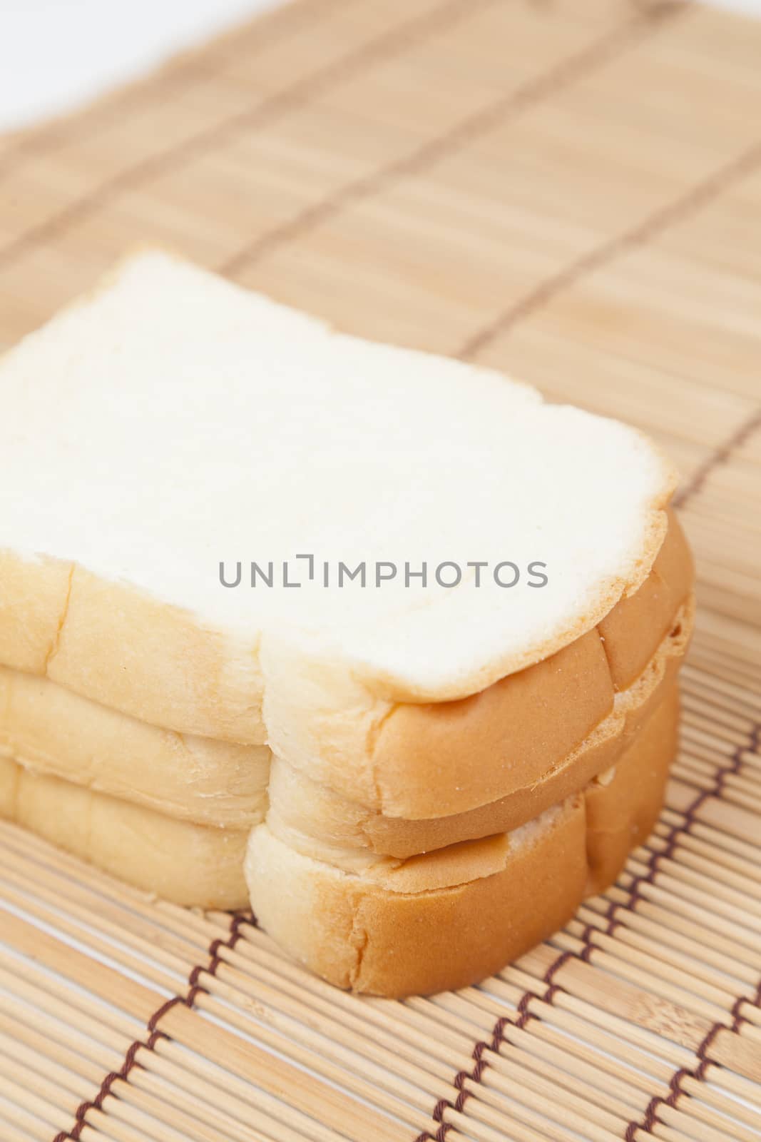 Sliced ������bread on the wooden plate.pack-shot bread in studio.