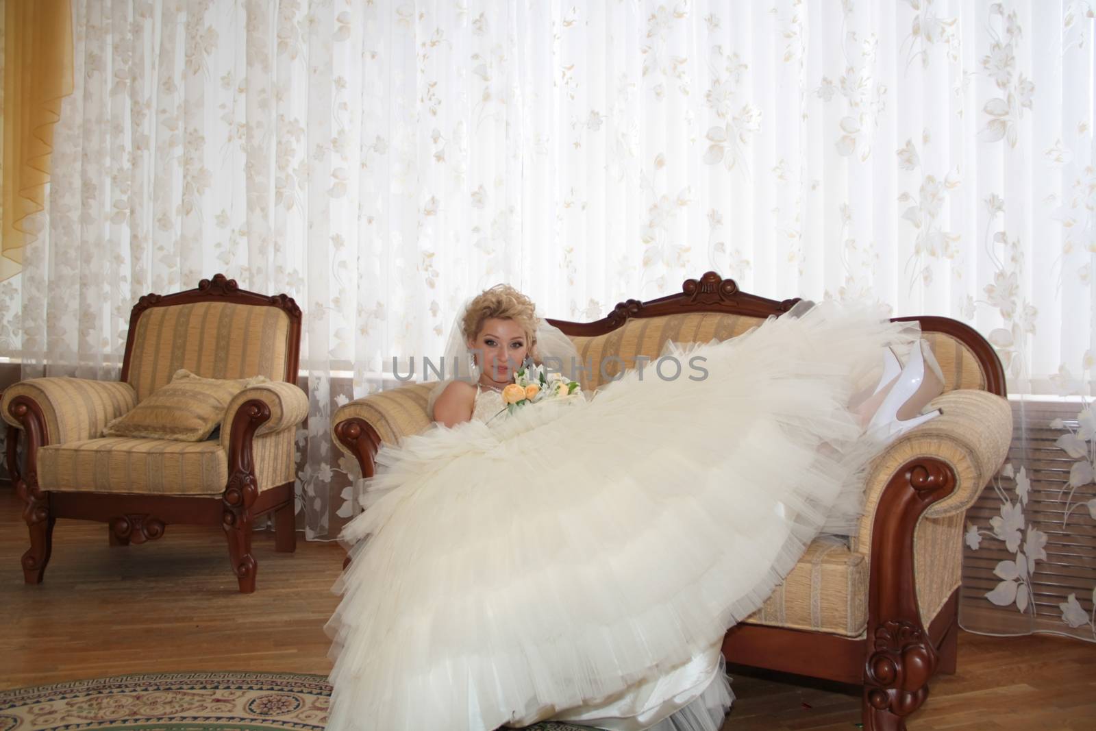 The young beautiful wife in the wedding day