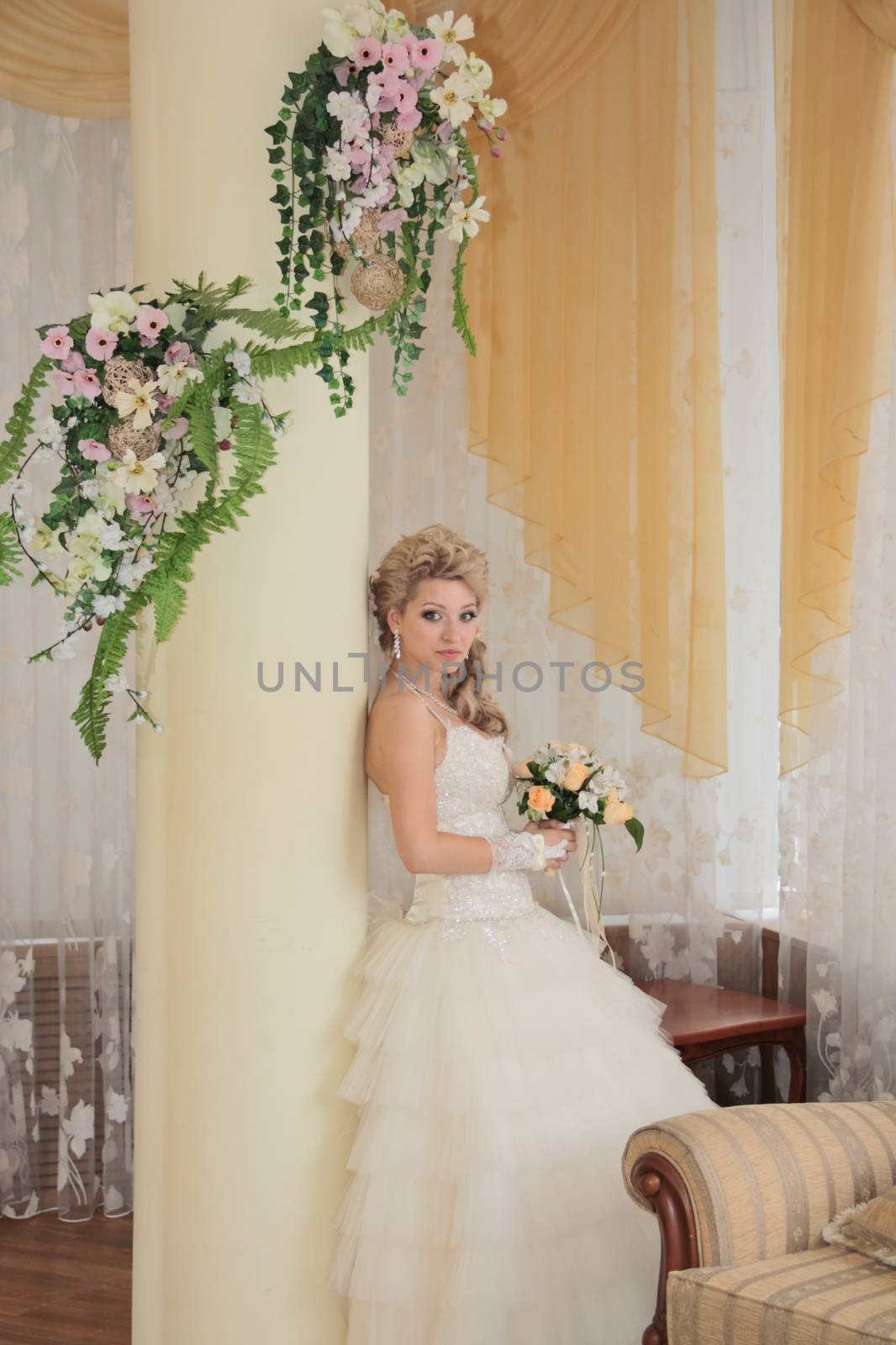 The young beautiful wife in the wedding day