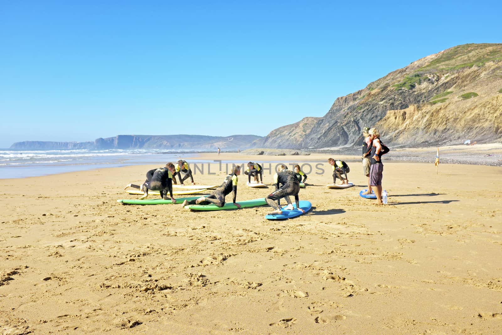 VALE FIGUEIRAS, PORTUGAL - August 9 2014:  Surfers getting lessons