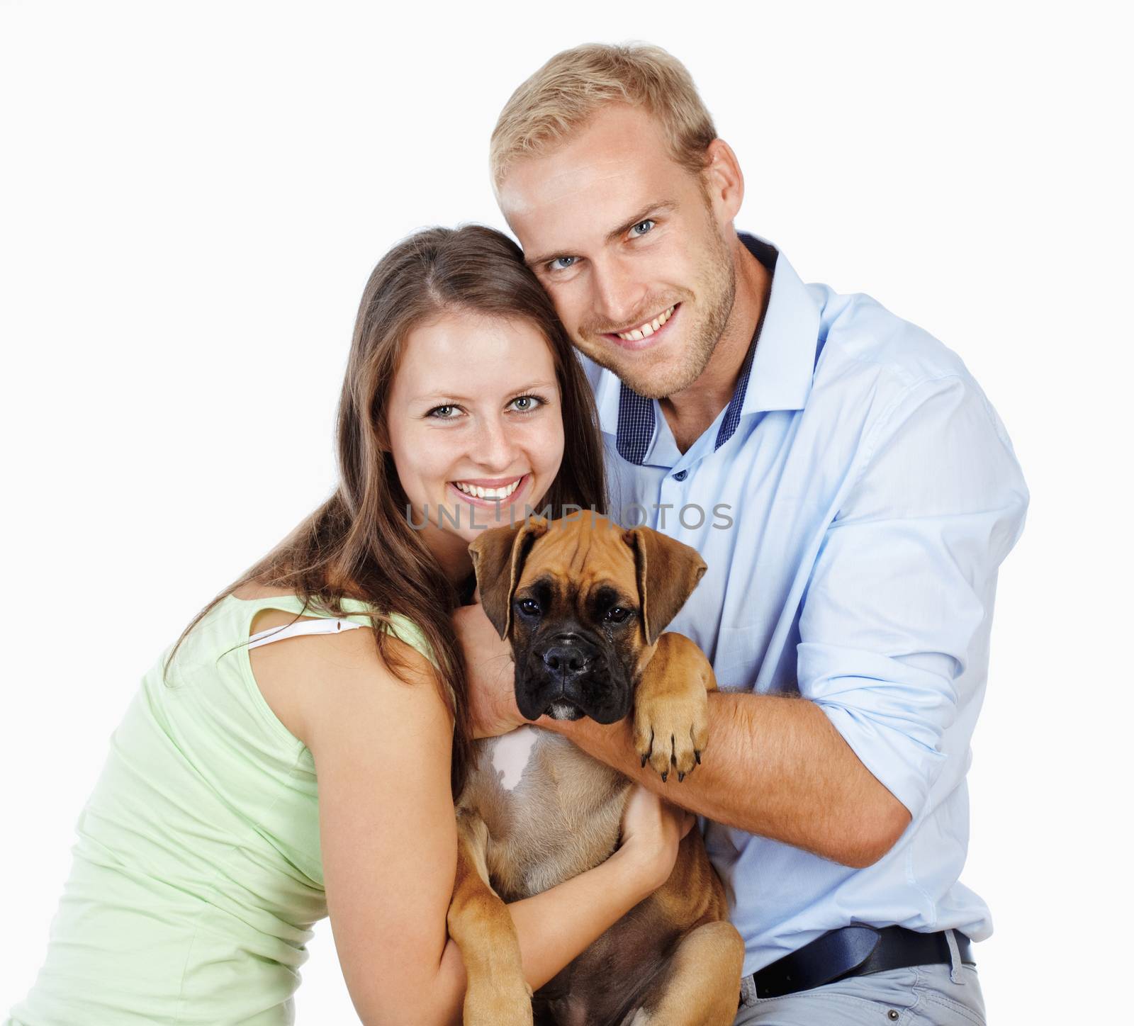 Portrait of a Happy Young Couple with a Dog. by courtyardpix