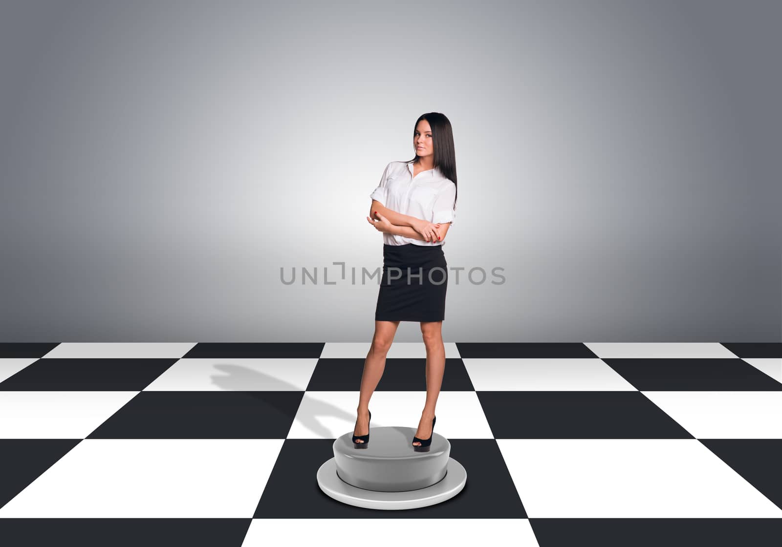 Beautiful businesswoman standing with crossed arms by cherezoff