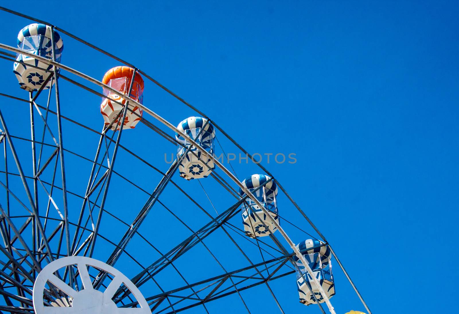close up Ferris Wheel on cleary sky