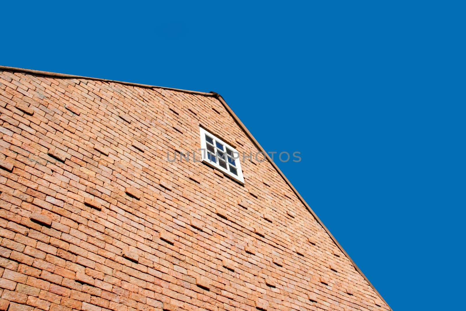 brick barn and sky by yanukit