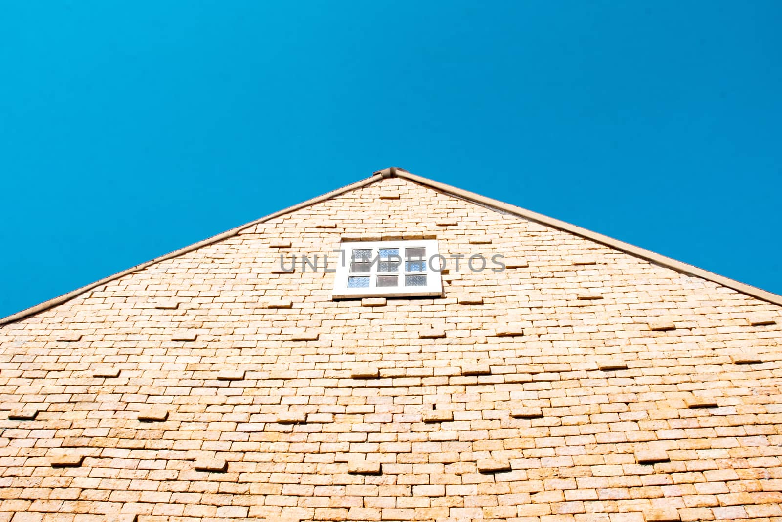 brick barn and sky