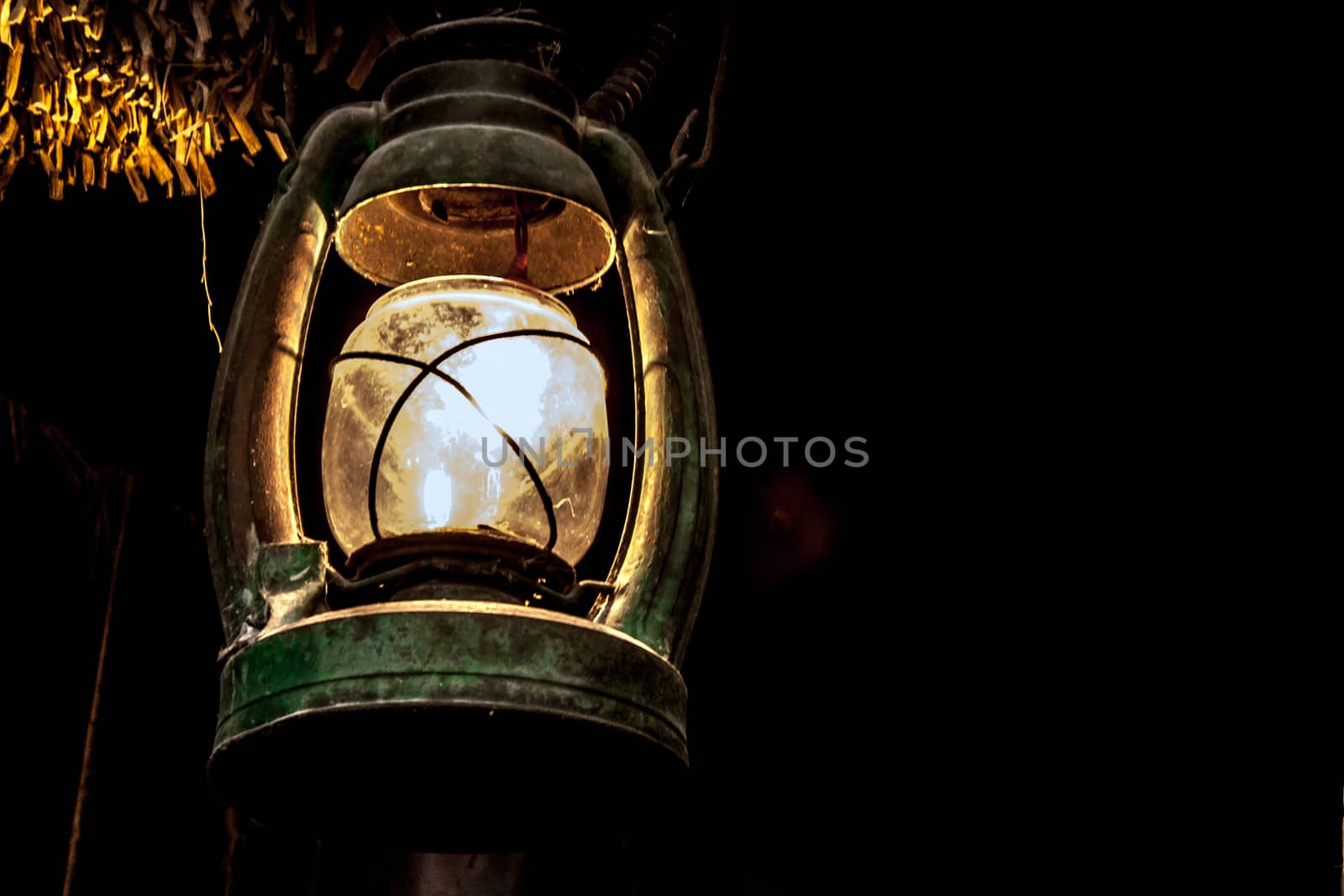 light from vintage lamp on dark