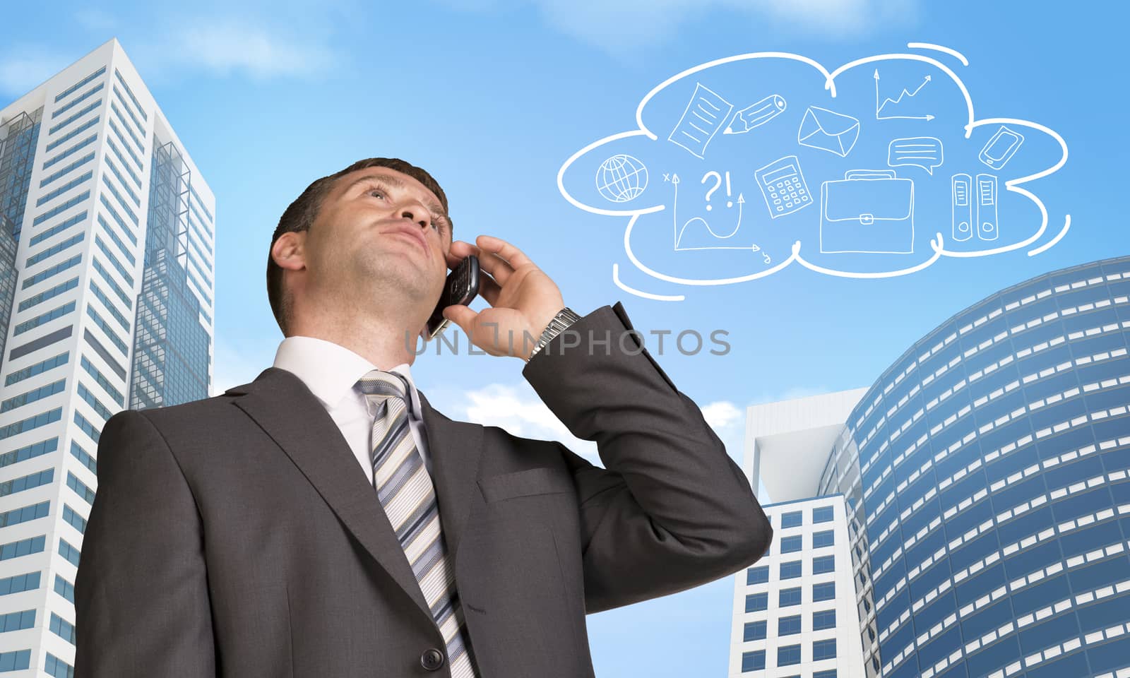 Businessman talking on the phone. Skyscrapers and cloud with business sketches in background