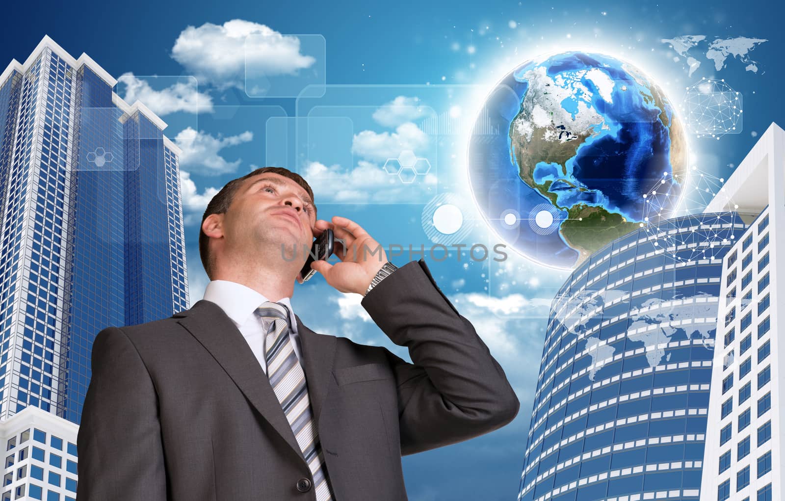 Businessman talking on the phone. Skyscrapers and Earth with transparent rectangles in background