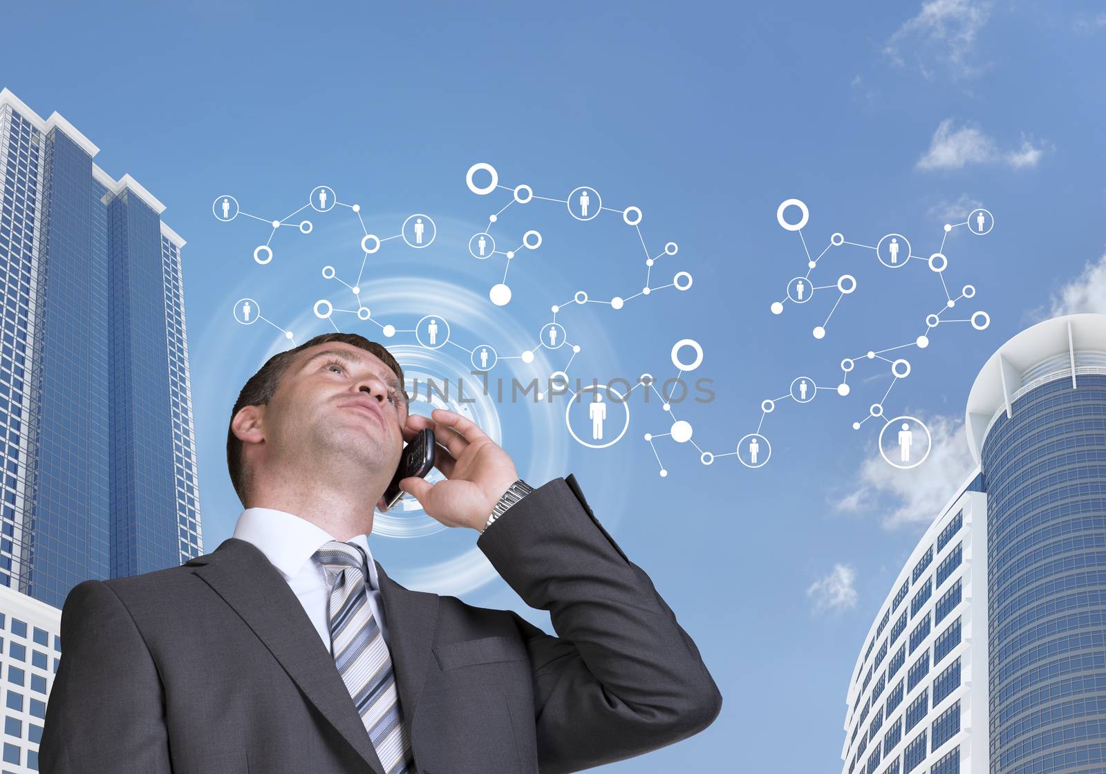 Businessman talking on the phone. Skyscrapers and sky with network in background