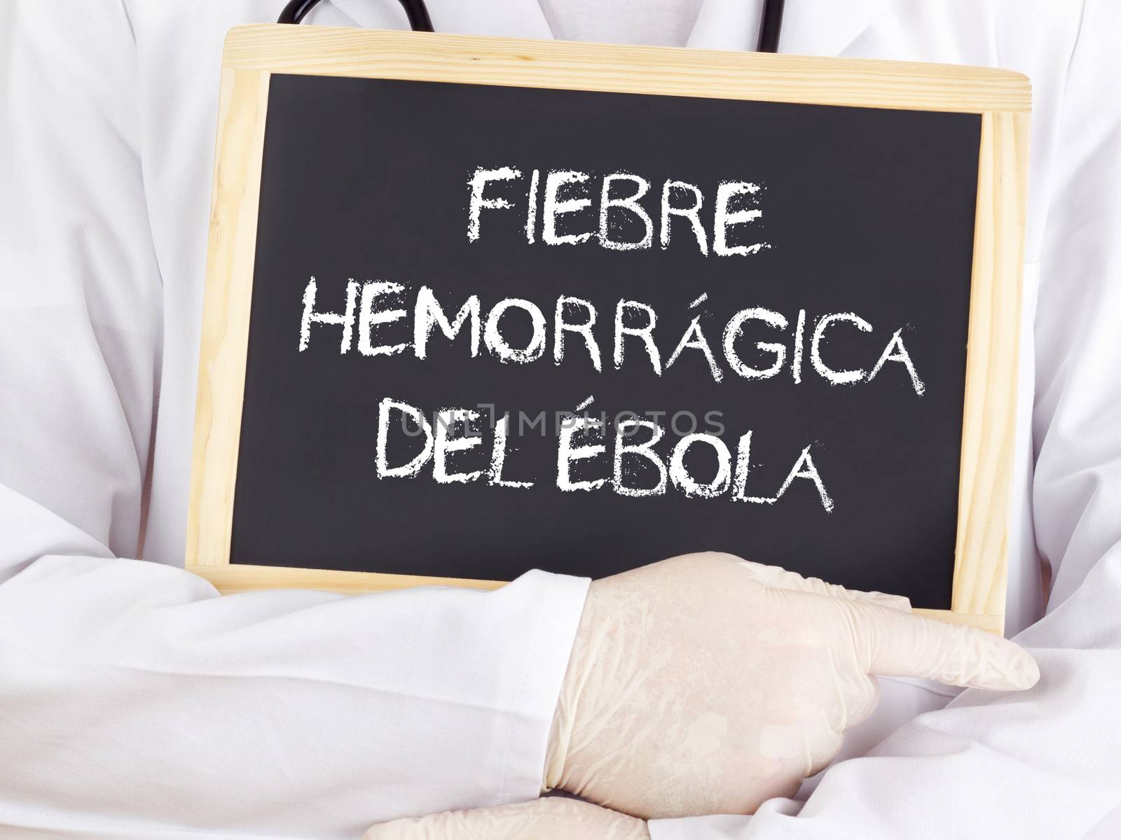 Doctor shows information: Ebola in spanish language