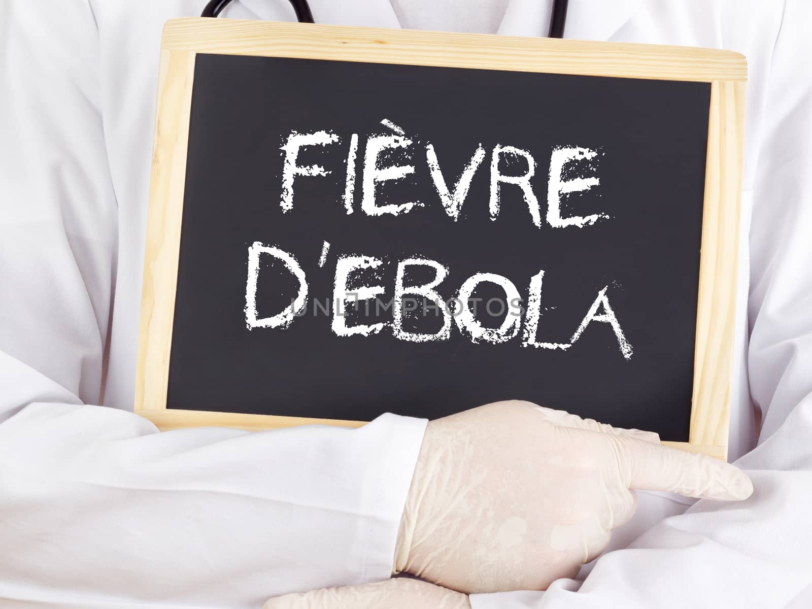 Doctor shows information: Ebola in french language by gwolters