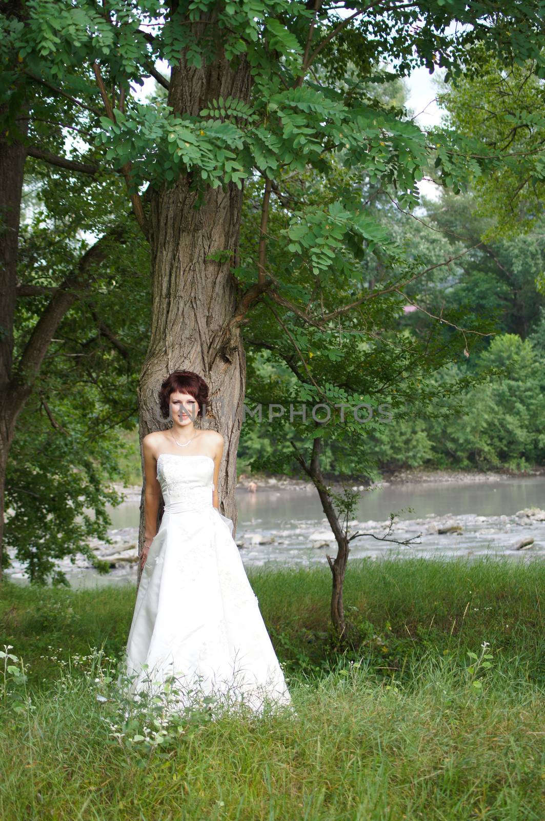 The young beautiful wife in the wedding day