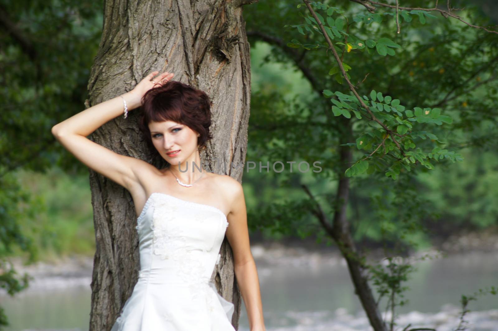 The young beautiful wife in the wedding day