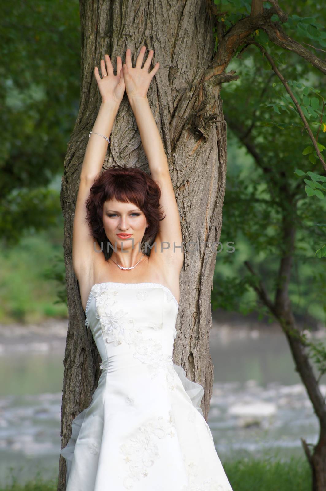 The young beautiful wife in the wedding day